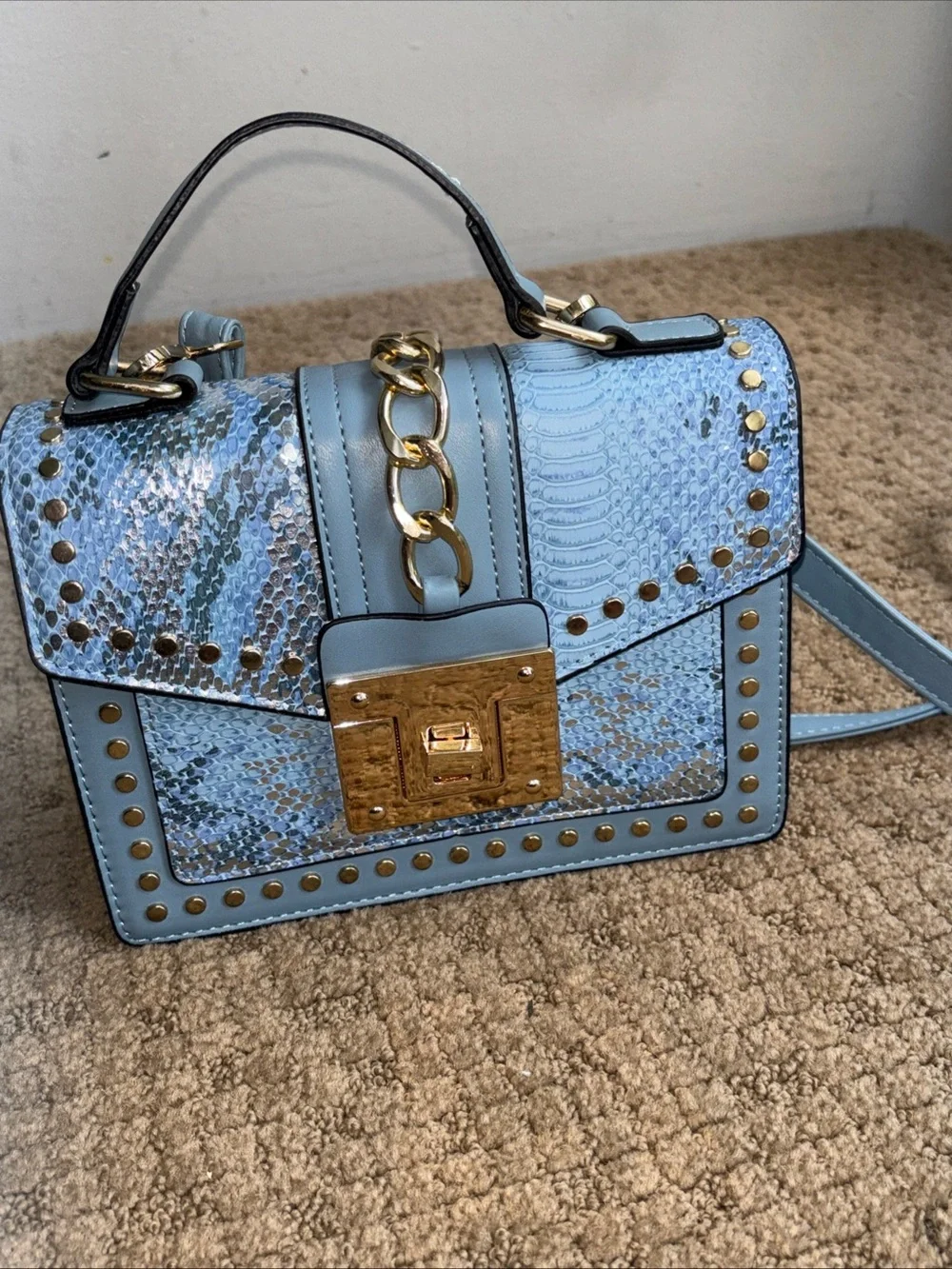 Faux snakeskin crossbody blue purse new with minor mark on bottom